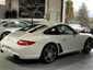 Porsche 997 Carrera 2009 — vue arriere trois-quarts (11)