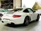 Porsche 997 Carrera 2009 — vue arriere trois-quarts (12)