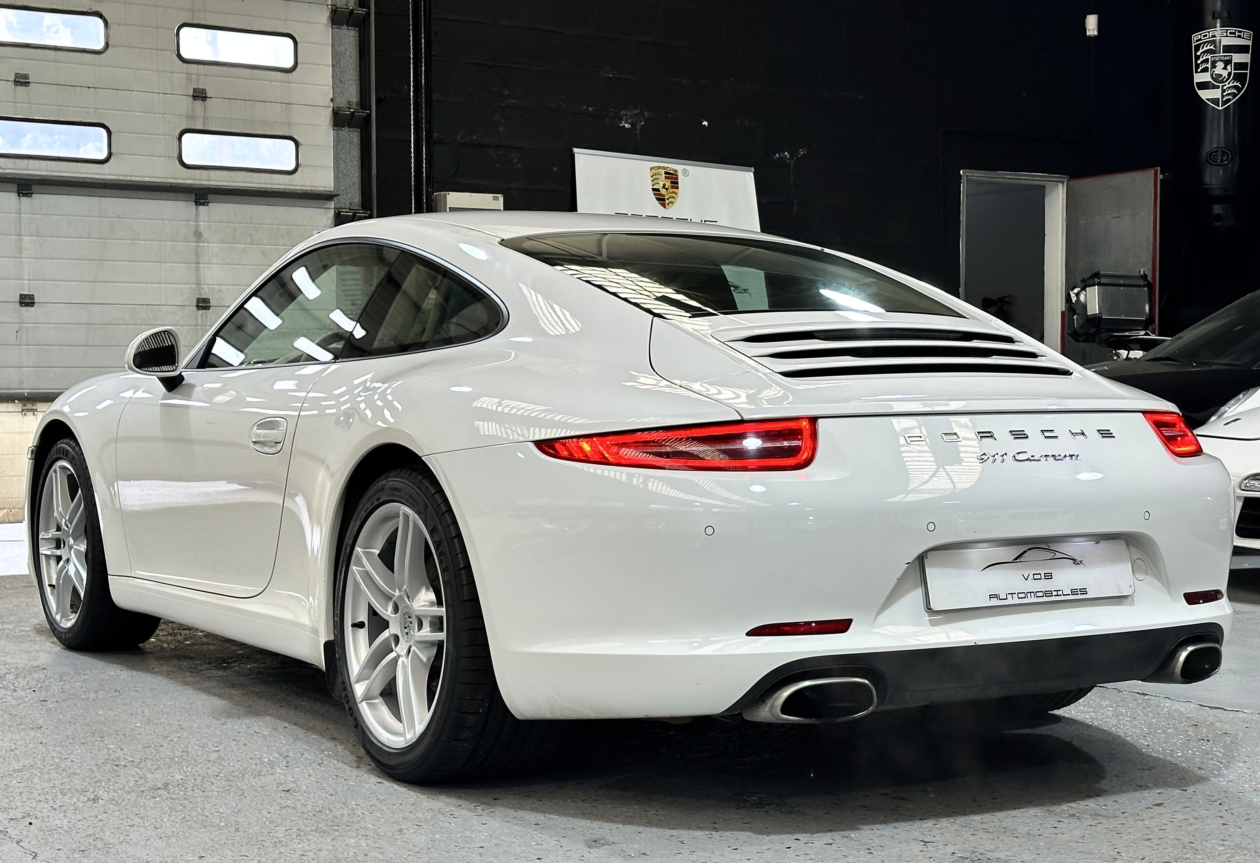 Porsche 991 Carrera 2012 — vue arriere trois-quarts (9)