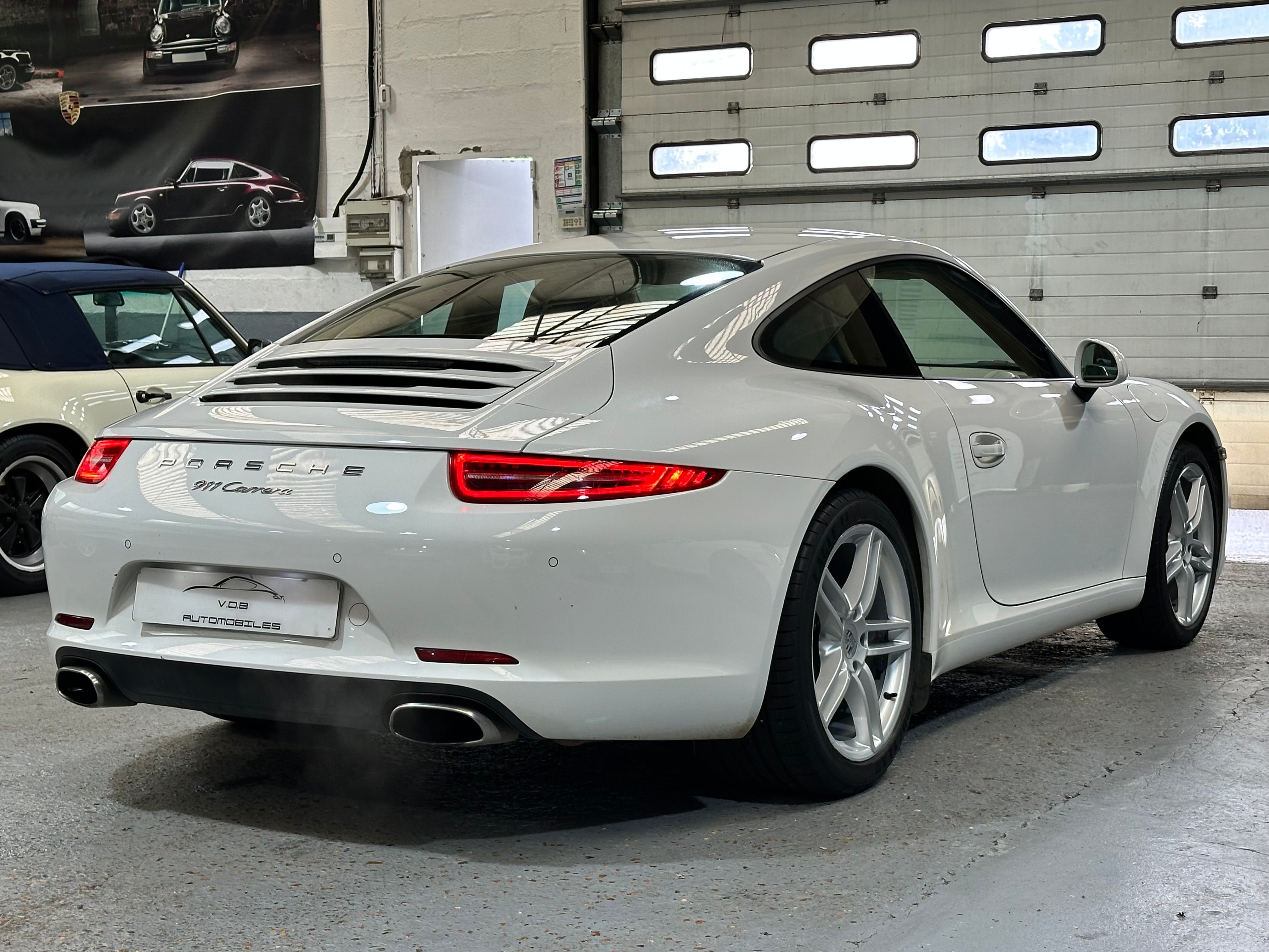 Porsche 991 Carrera 2012 — vue arriere trois-quarts (10)