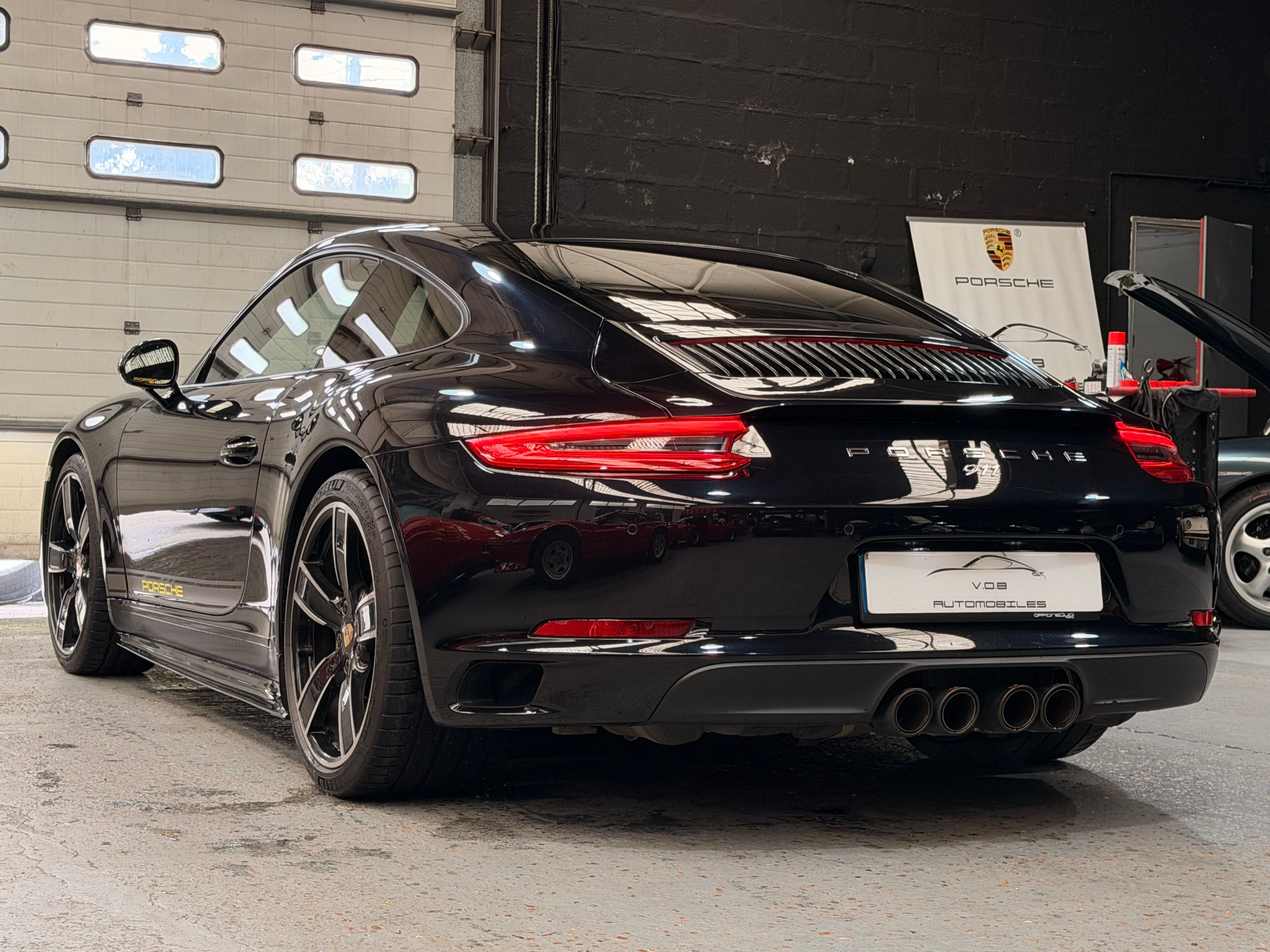 Porsche 991 Carrera 2017 — vue arriere trois-quarts (9)