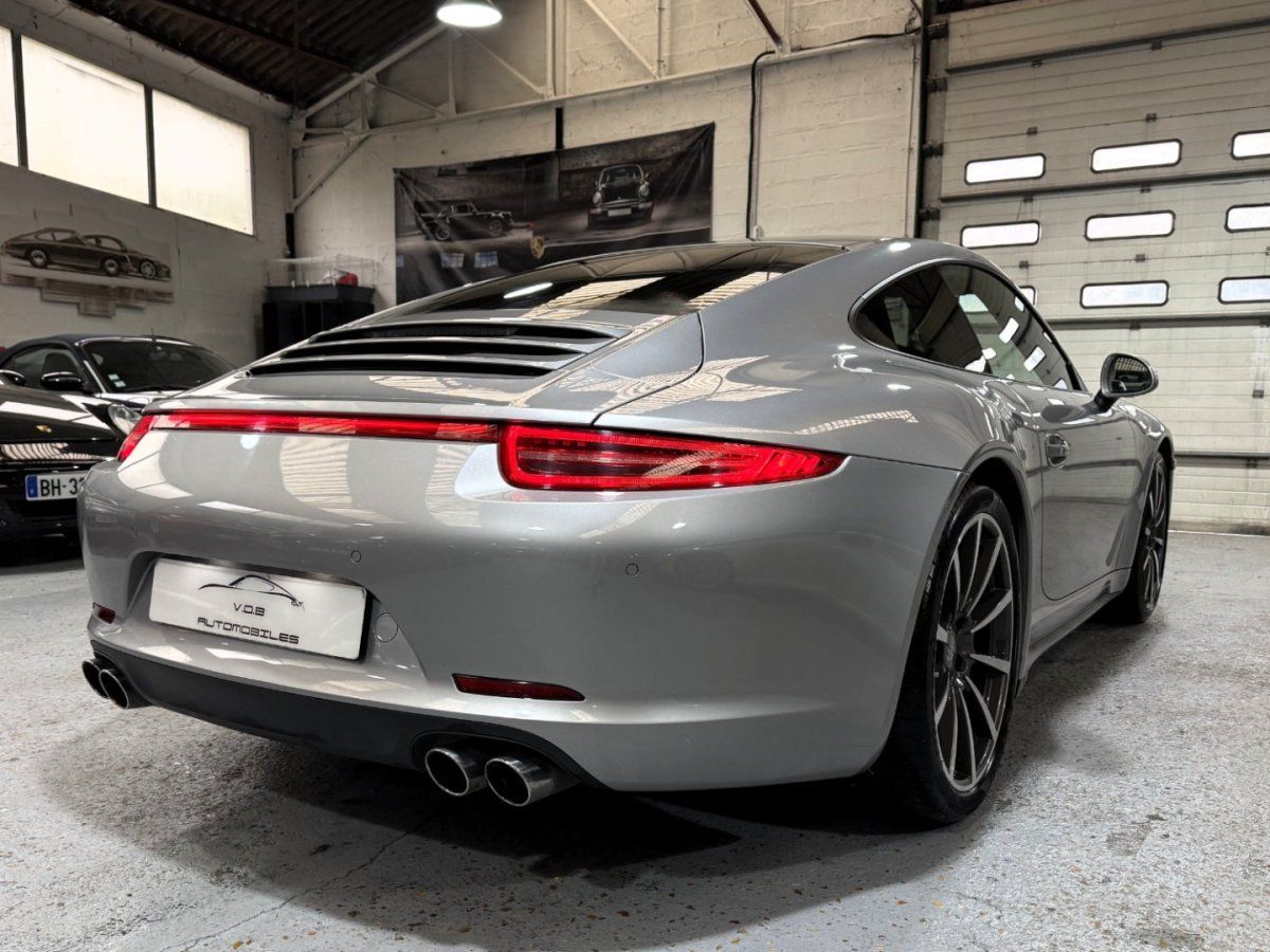 Porsche 991 Carrera 4S 2013 — vue arriere trois-quarts (11)