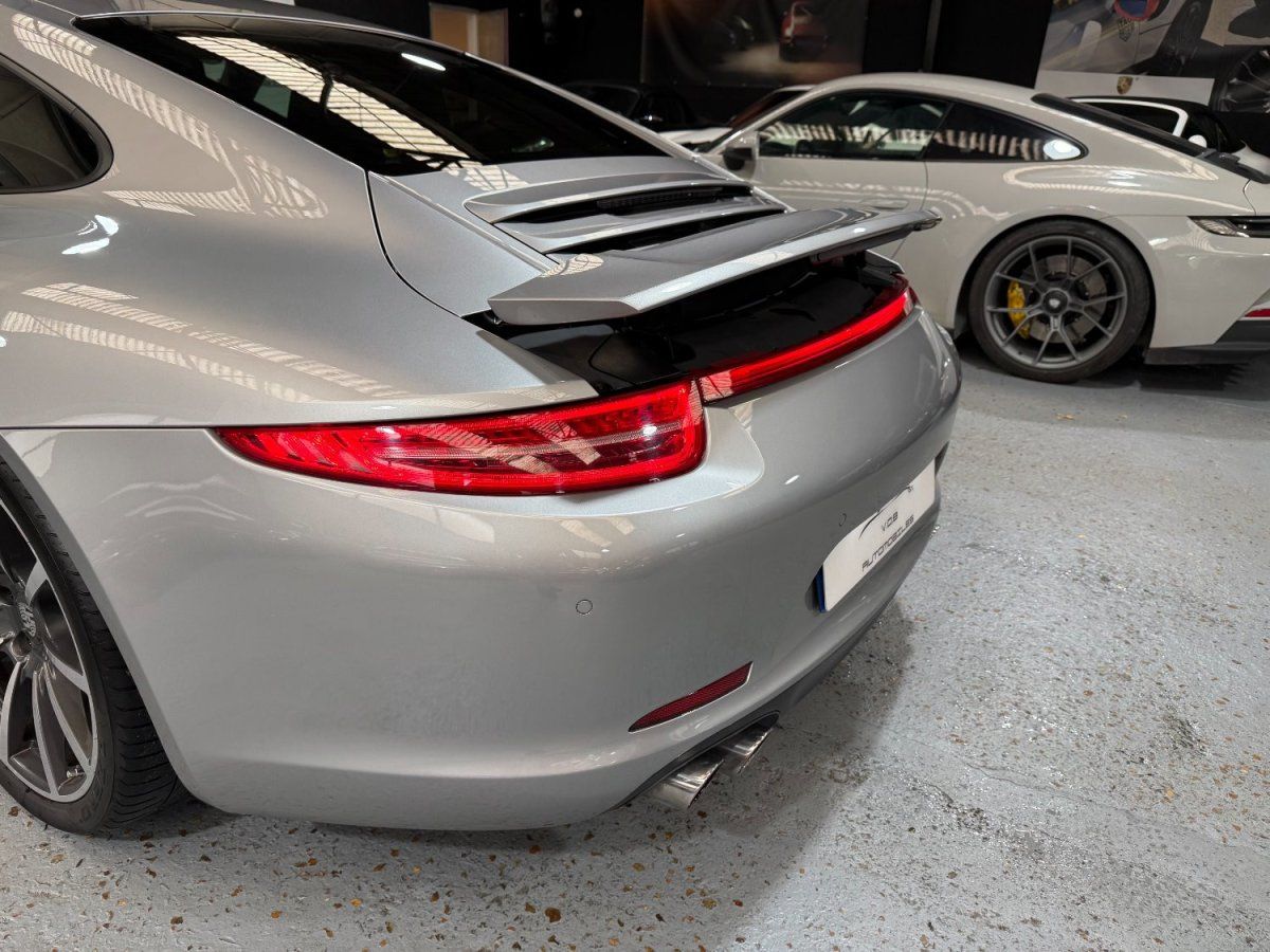 Porsche 991 Carrera 4S 2013 — vue arriere trois-quarts (14)