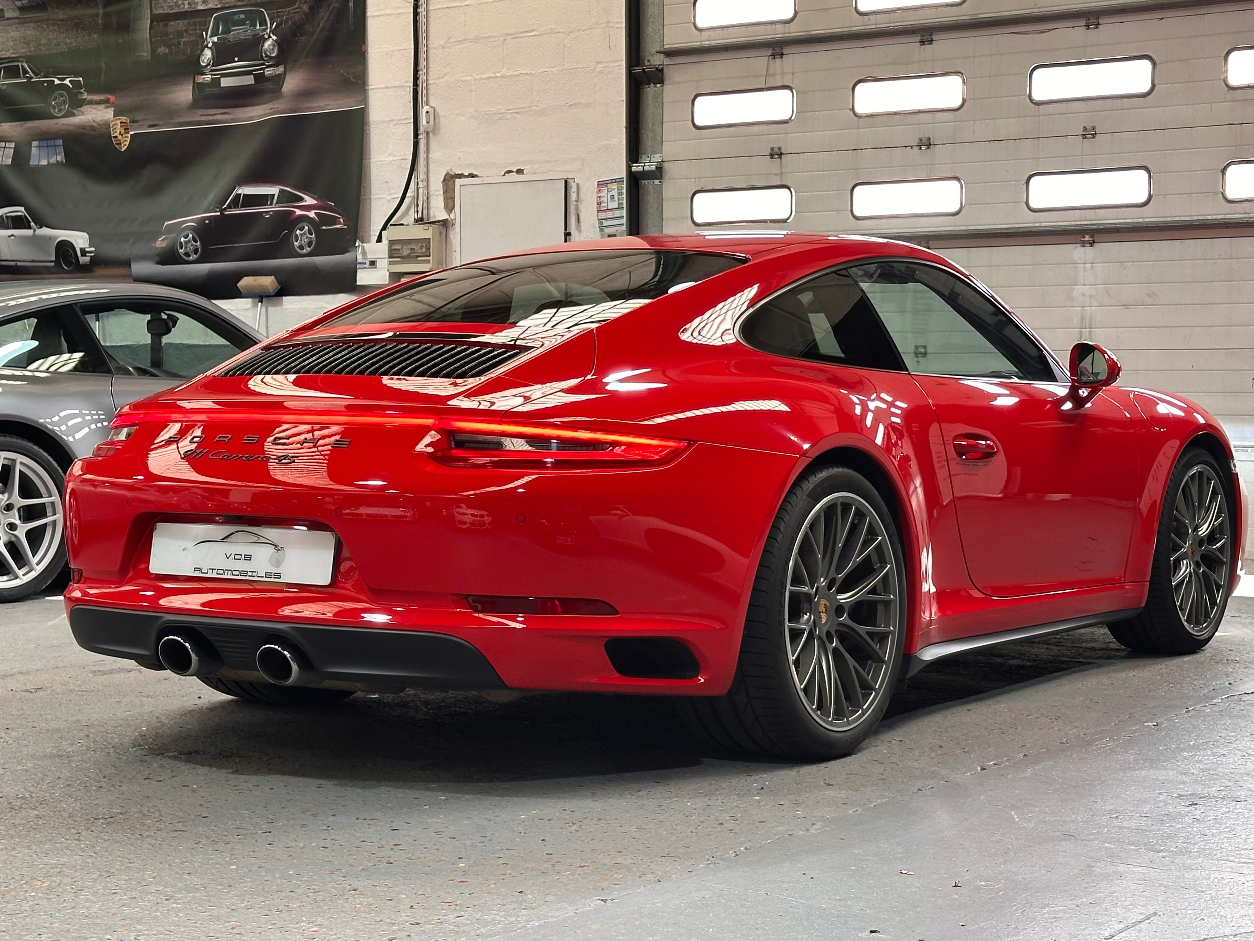 Porsche 991 Carrera 4S 2016 — vue arriere trois-quarts (11)