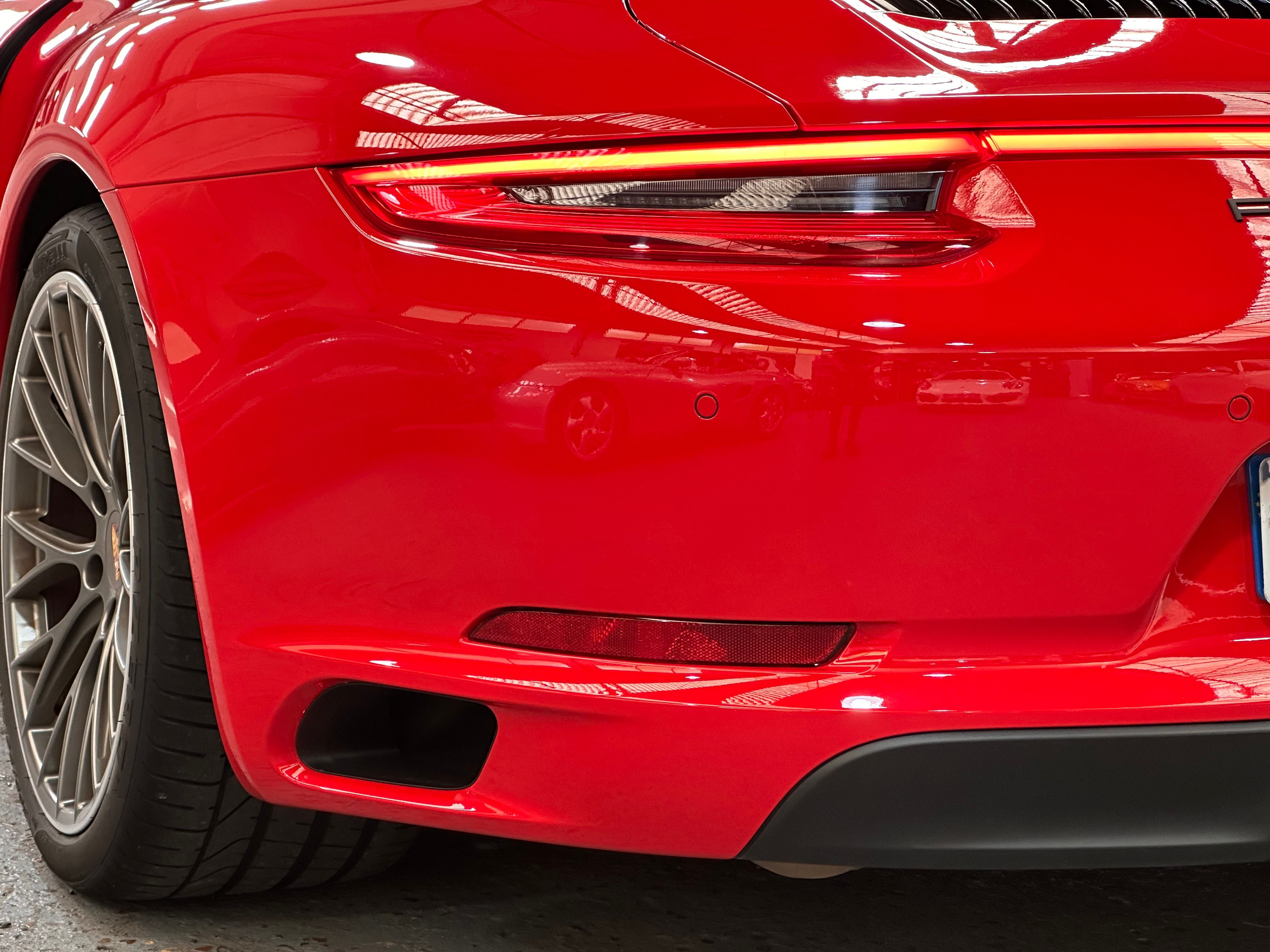 Porsche 991 Carrera 4S 2016 — vue arriere trois-quarts (12)