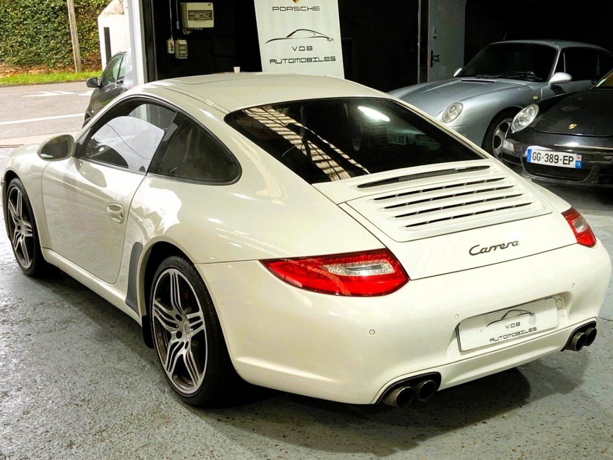Porsche 997 Carrera 2009 — vue arriere trois-quarts (10)