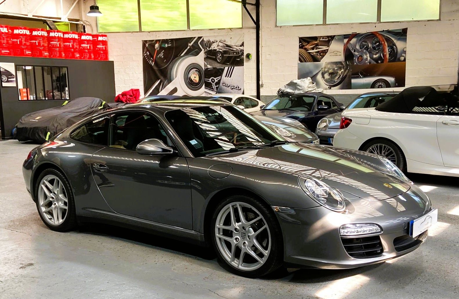 Porsche 997 Carrera 4 2011 — vue avant trois-quarts (6)