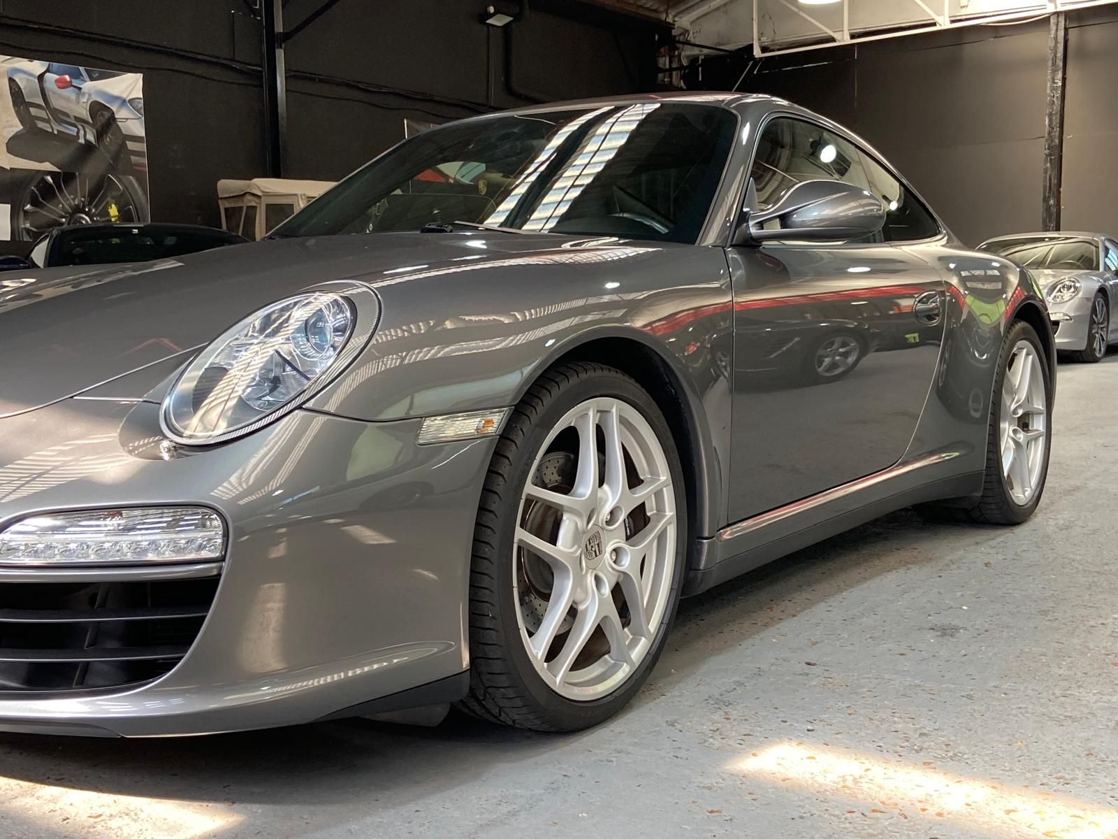 Porsche 997 Carrera 4 2011 — vue avant trois-quarts (3)
