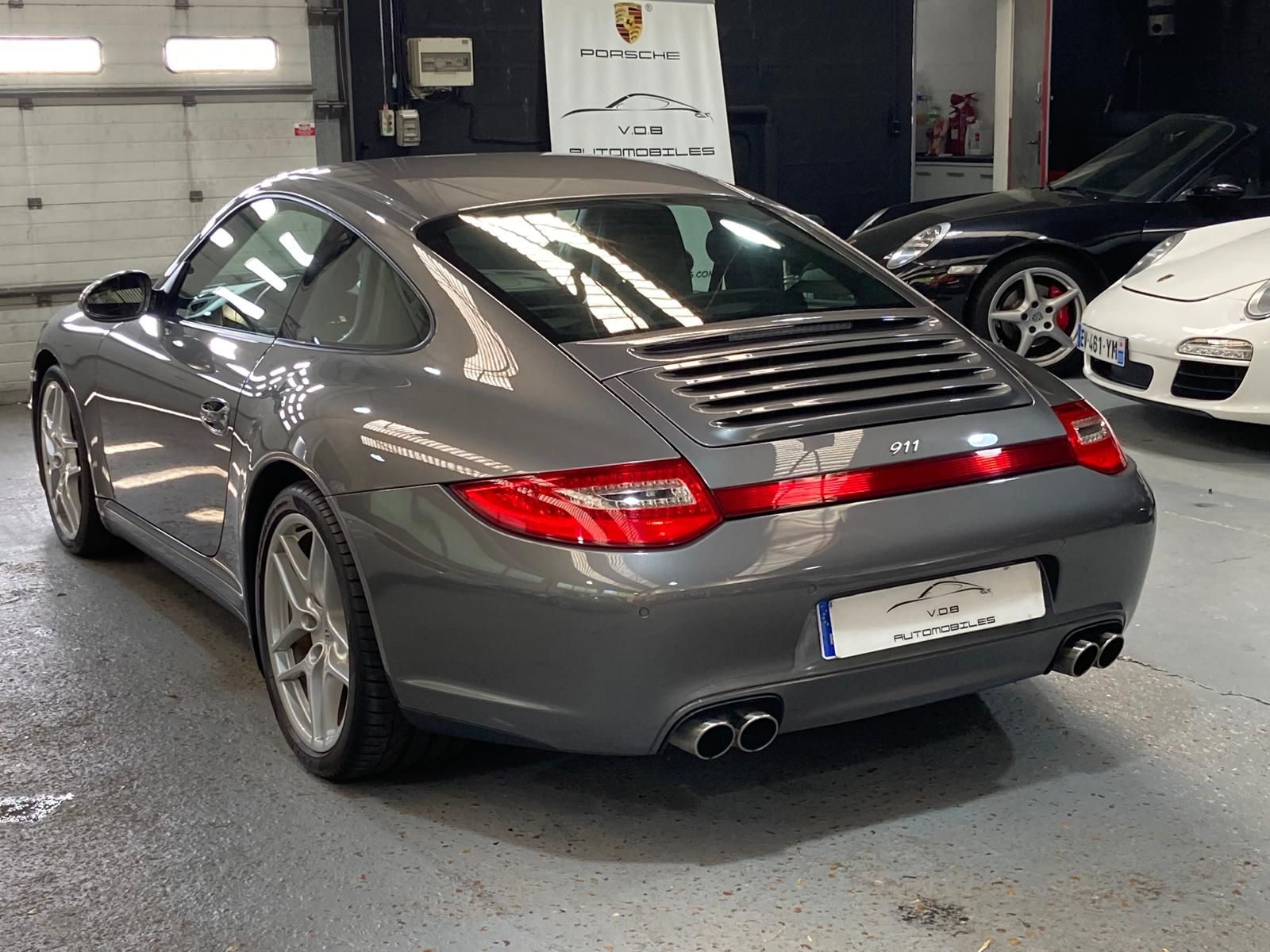 Porsche 997 Carrera 4 2011 — vue arriere trois-quarts (13)