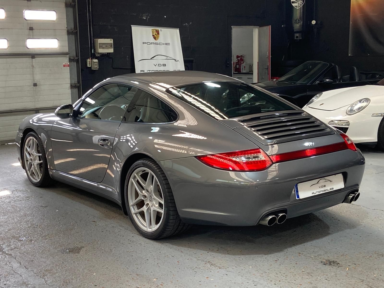 Porsche 997 Carrera 4 2011 — vue arriere trois-quarts (20)