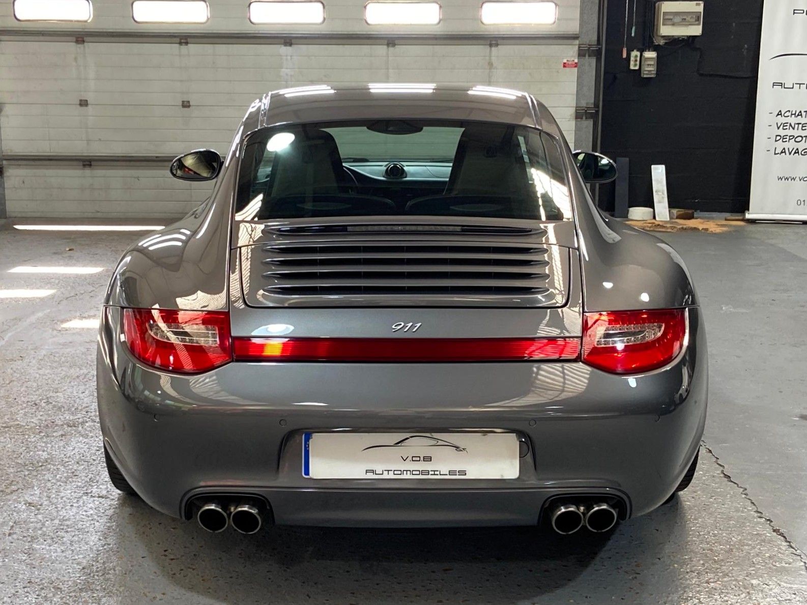 Porsche 997 Carrera 4 2011 — vue arriere (22)