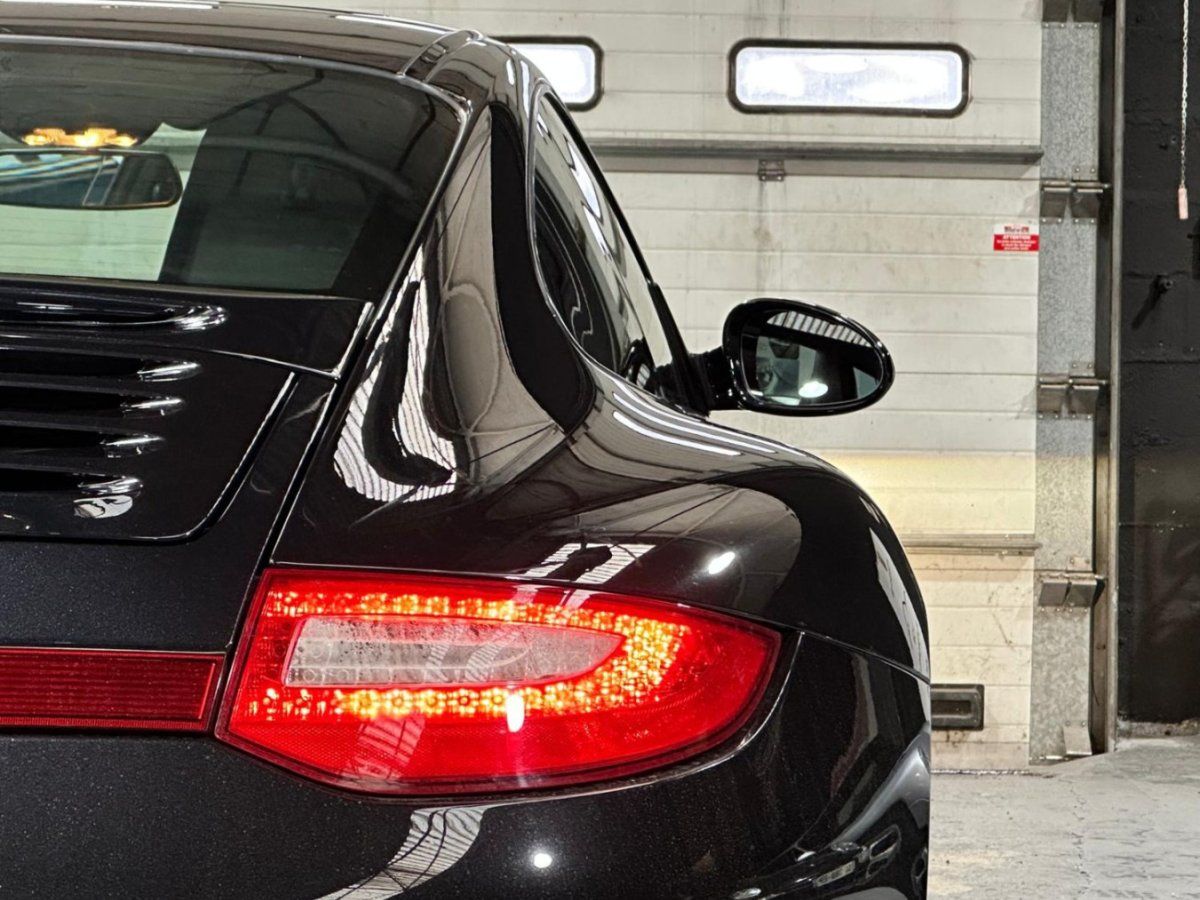 Porsche 997 Carrera 4S 2009 — detail arriere (17)