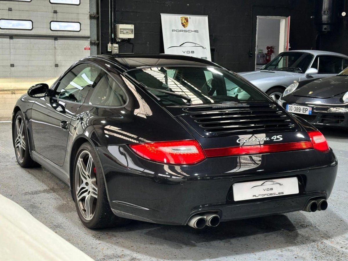 Porsche 997 Carrera 4S 2009 — vue arriere trois-quarts (12)