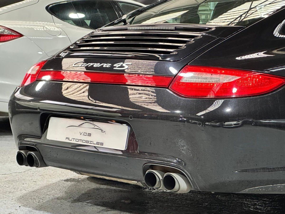 Porsche 997 Carrera 4S 2009 — vue arriere trois-quarts (13)
