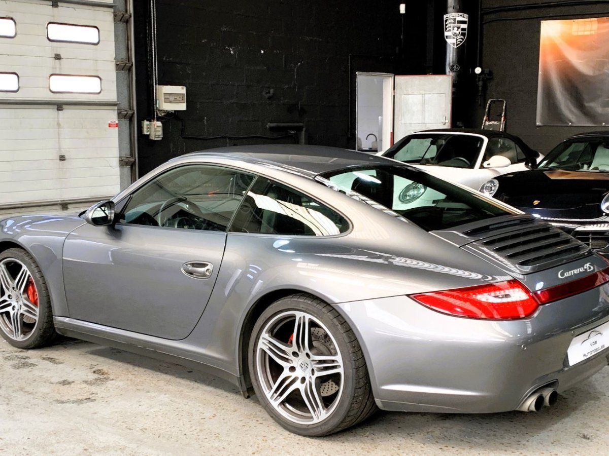 Porsche 997 Carrera 4S 2009 — vue arriere trois-quarts (10)