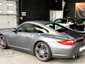 Porsche 997 Carrera 4S 2009 — vue arriere trois-quarts (10)