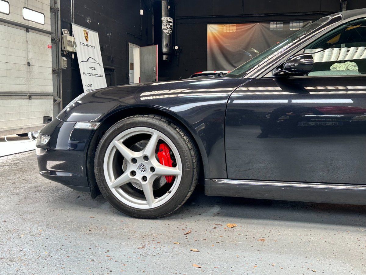 Porsche 997 Carrera Cabriolet 2006 — vue avant trois-quarts (5)