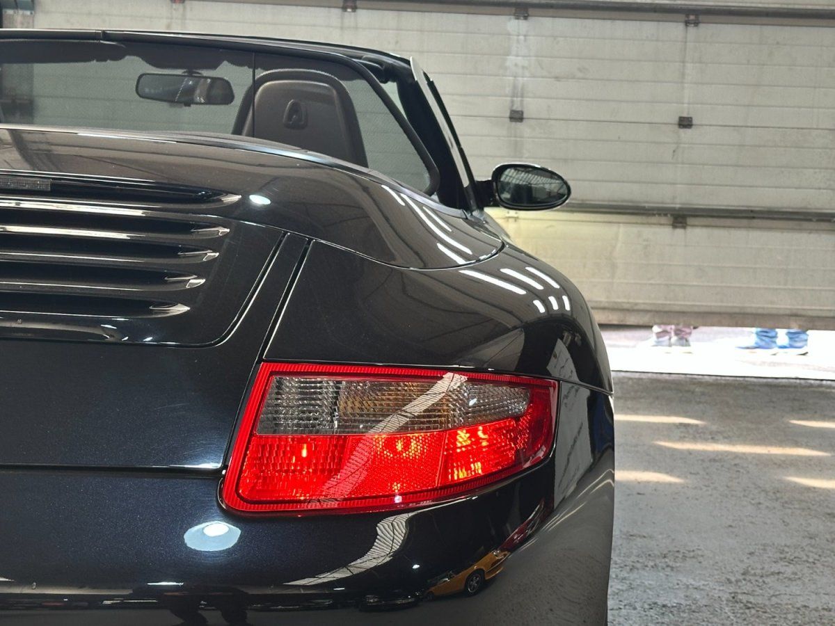 Porsche 997 Carrera Cabriolet 2006 — vue arriere trois-quarts (13)