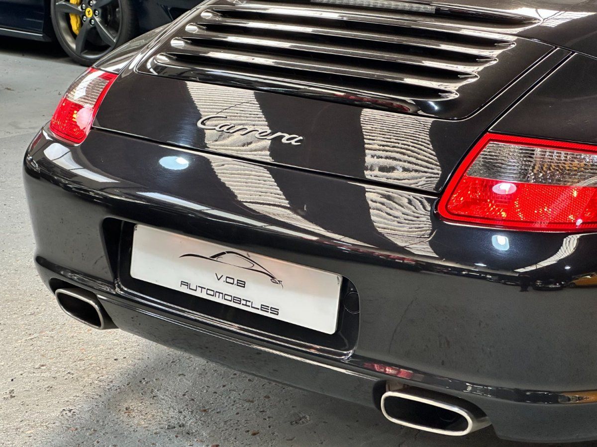 Porsche 997 Carrera Cabriolet 2006 — vue arriere trois-quarts (14)