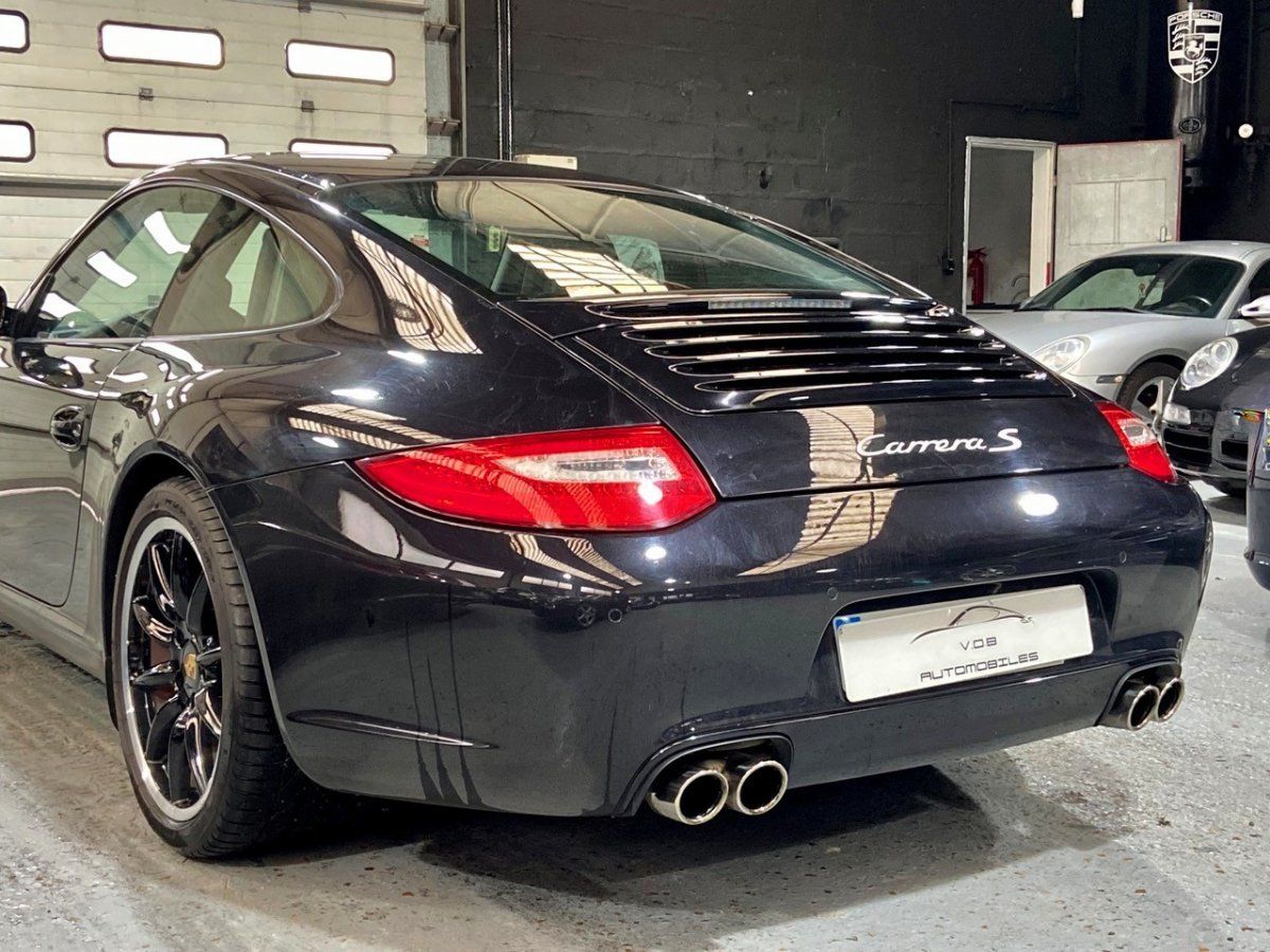 Porsche 997 Carrera S 2009 — vue arriere trois-quarts (10)