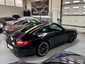 Porsche 997 Carrera S 2009 — vue arriere trois-quarts (13)