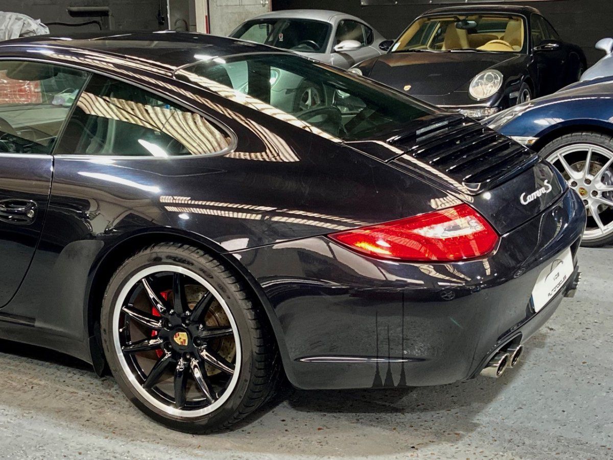 Porsche 997 Carrera S 2009 — vue arriere trois-quarts (15)