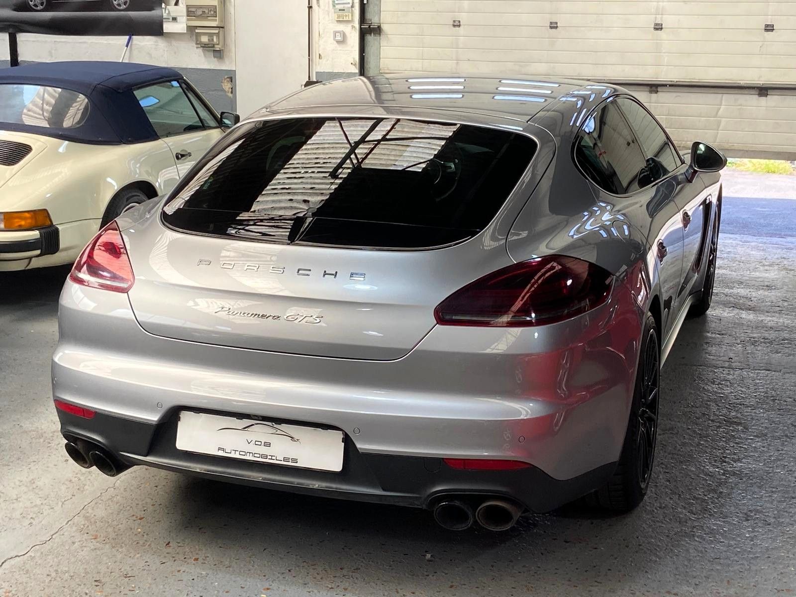 Porsche Panamera GTS 2014 — vue arriere trois-quarts (12)